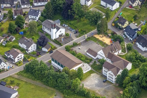 Aerial view, Catholic Church of the Nativity of the Virgin Mary and Primary School in Hützemert,