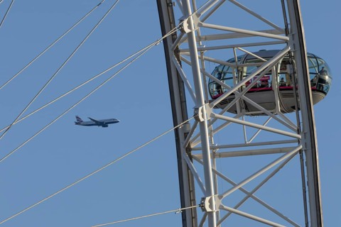 Airbus A320-232 jet passenger aircraft of British Airways airlines in flight in a blue sky with the