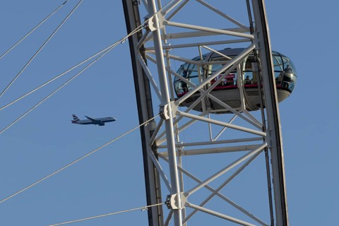 Airbus A320-232 jet passenger aircraft of British Airways airlines in flight in a blue sky with the