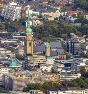 City centre view with St. Marien Evangelical Church and St. Reinoldi Church in the City district in