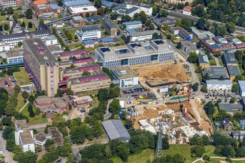 Aerial view, construction site and new building at the University Hospital Düsseldorf in the