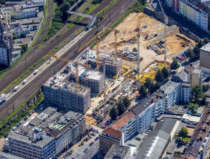 Aerial view, construction site and new building Le Quartier Central at the corner of Worringer