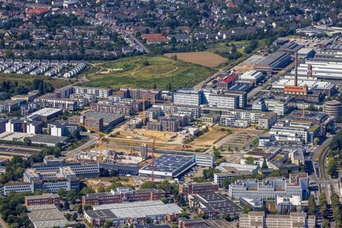 Aerial view, construction site and new building forty549 residential neighbourhood at Hansaallee