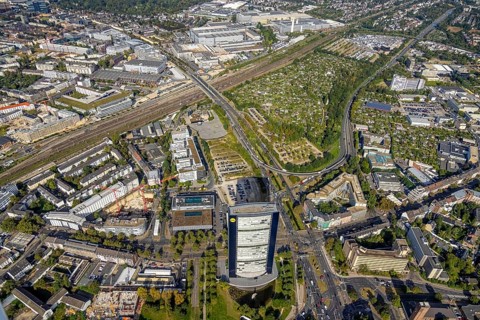 Aerial view, ARAG Tower with construction site on Mercedesstraße with new construction of an office