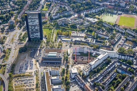 Aerial view, ARAG Tower with construction site on Mercedesstraße with new construction of an office