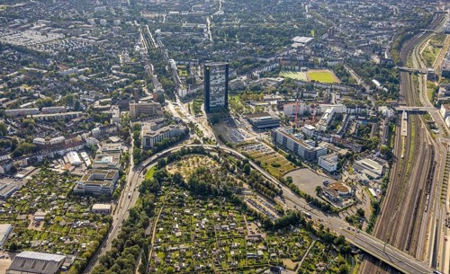 Aerial view, ARAG Tower with construction site on Mercedesstraße with new construction of an office