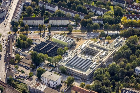 Aerial view, construction site at Friedrich-Rückert-Gymnasium and Weiterbildungskolleg with evening