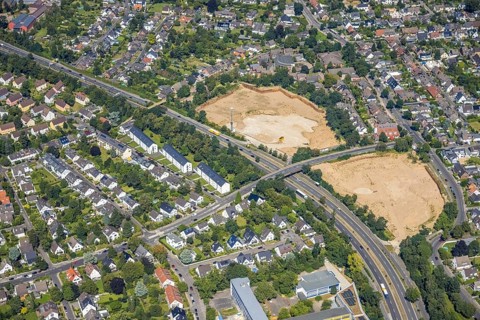 Aerial view, brownfield site after fashion house demolition on Danziger Straße for planned new