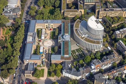 Aerial view, art palace and semicircular building of the Ministry of the Environment of North