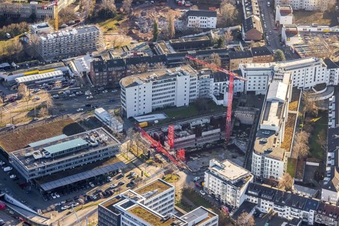 Aerial view, construction site at the corner of Mercedesstraße and Münsterstraße with new