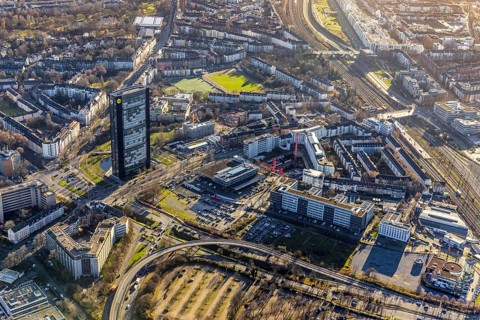 Aerial view, ARAG Tower with construction site at the corner of Mercedesstraße and Münsterstraße