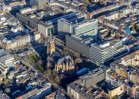 Aerial view, office buildings and commercial buildings Friedrichstraße with the catholic church St.