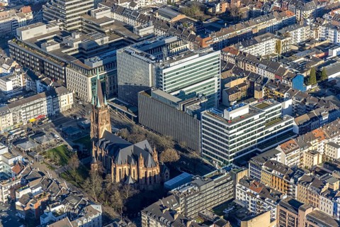 Aerial view, office buildings and commercial buildings Friedrichstraße with the catholic church St.