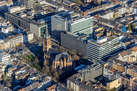 Aerial view, office buildings and commercial buildings Friedrichstraße with the catholic church St.
