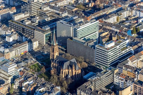 Aerial view, office buildings and commercial buildings Friedrichstraße with the catholic church St.