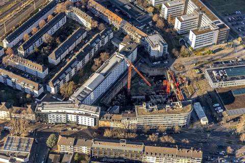 Aerial view, construction site at the corner of Mercedesstraße and Münsterstraße with new