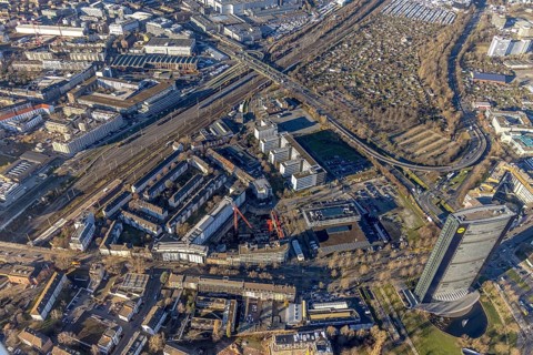 Aerial view, ARAG Tower with construction site on Mercedesstraße with new construction of an office
