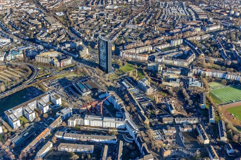 Aerial view, ARAG Tower with construction site on Mercedesstraße with new construction of an office