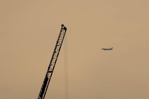 Boeing 787-9 Dreamliner jet passenger aircraft of British Airways airlines in flight at sunset,