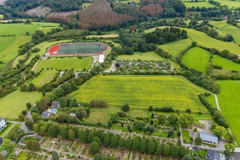 Aerial view, meadows and fields at the Klevinghauser Straße between cemetery and sports field in