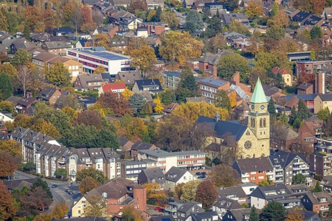 Aerial view, city centre view with catholic church St. John the Baptist in the district Kirchhellen