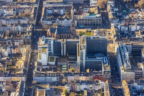 Aerial view, office buildings and commercial buildings Friedrichstraße with the catholic church St.