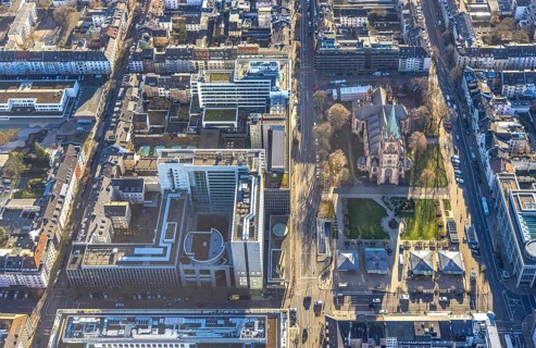 Aerial view, office buildings and commercial buildings Friedrichstraße with the catholic church St.