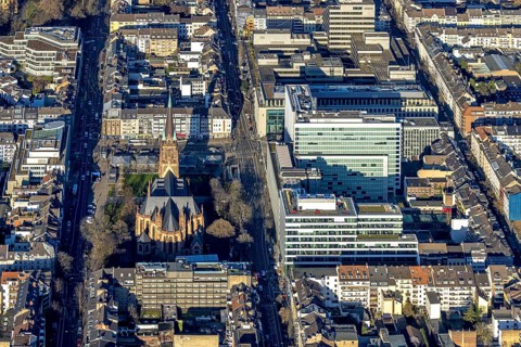 Aerial view, office buildings and commercial buildings Friedrichstraße with the catholic church St.