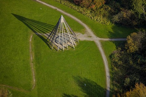 Aerial view, pyramid sculpture with shadows in the health park Quellenbusch in the district south