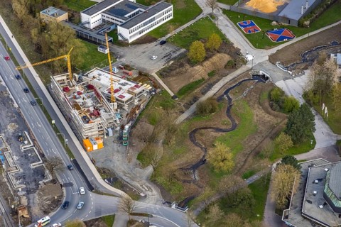 Aerial view, construction site and new construction of vocational training centre on the