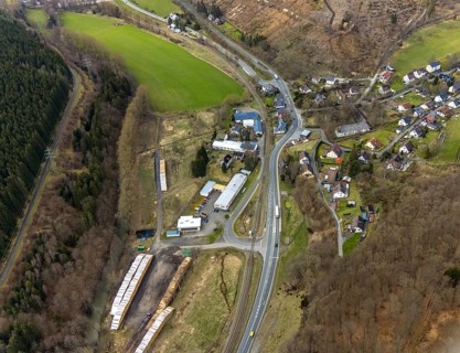 Aerial photo, Hopfengarten timber yard, Saßmannshausen town centre, Bad Laasphe, Siegerland, North