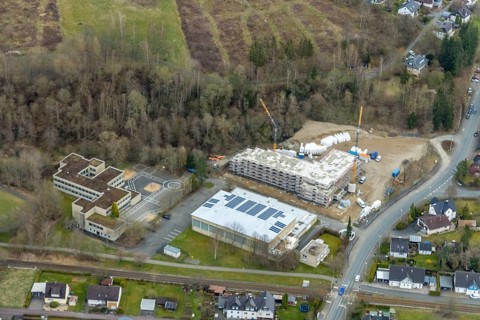 Aerial view, construction site and new construction of a senior citizens' residence on the former