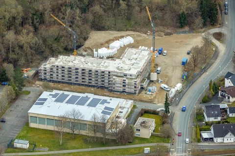 Aerial view, construction site and new construction of a senior citizens' residence on the former