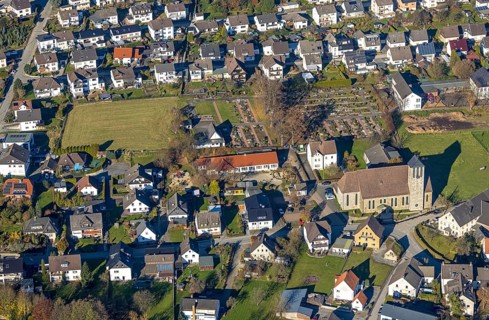 Aerial view, Kath. Church Heilige-Drei-Könige and cemetery Garbeck as well as kindergarten in the
