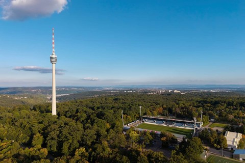 TV tower next to the Gazi stadium, with a view over extensive forests and soft clouds in the sky,