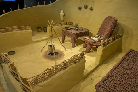 Reconstruction of a house with fireplace and furniture, Museum of Vucedol Culture, Vukovar,