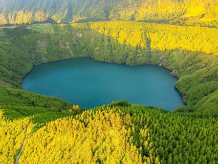 Lake Santiago. Sete Cidades Caldera at Sunset. Lush Green Hills with Forest. Azores, Sao Miguel