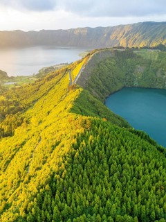 Lake Santiago and Blue Lake. Sete Cidades Caldera at Sunset. Lush Green Hills with Forest. Azores,