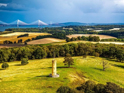 Binns Tower over Scotish farms and Forth Estuary from drone, House of the Binns, Linlithgow,