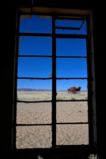 View from the window of the old German railway station of Garub into the Namib Desert, near Aus,