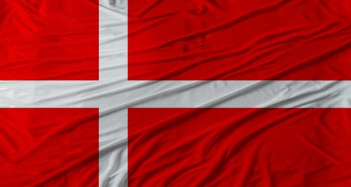 Danish flag waving. Flag of Denmark with cloth texture