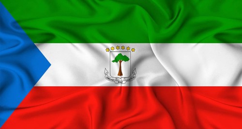 Realistic Equatorial Guinea flag waving. Close up of flag of Equatorial Guinea with cloth texture