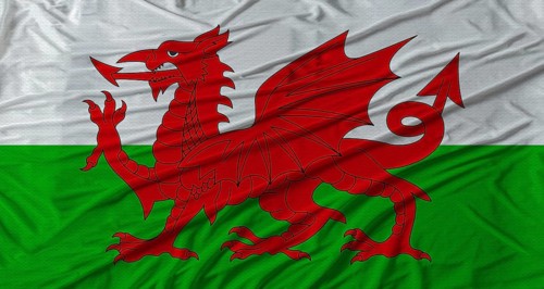 Welsh flag waving. Flag of Wales with cloth texture