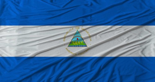 Nicaraguan flag waving. Flag of Nicaragua with cloth texture