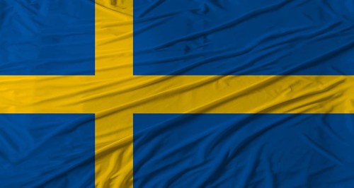 Swedish flag waving. Flag of Sweden with cloth texture