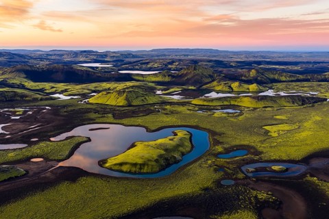 Moss-covered landscape and lakes in the Icelandic Highlands, Iceland