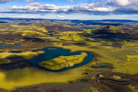 Moss-covered landscape and lakes in the Icelandic Highlands, Iceland