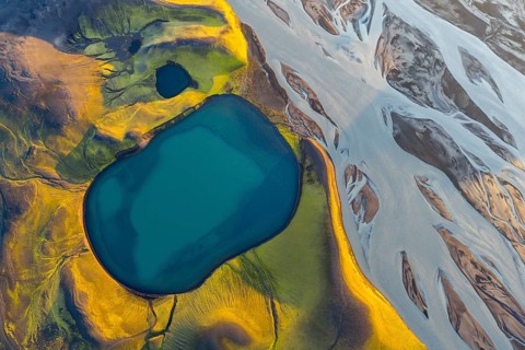 Turquoise crater lake and glacial river, Icelandic Highlands, Iceland
