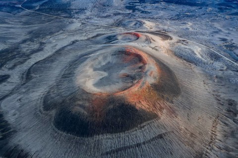 Red craters in black sand desert, Icelandic Highlands, Iceland