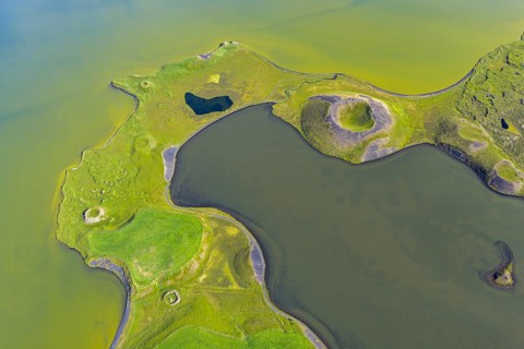Lake Myvatn with pseudo-crater, North Iceland, Iceland